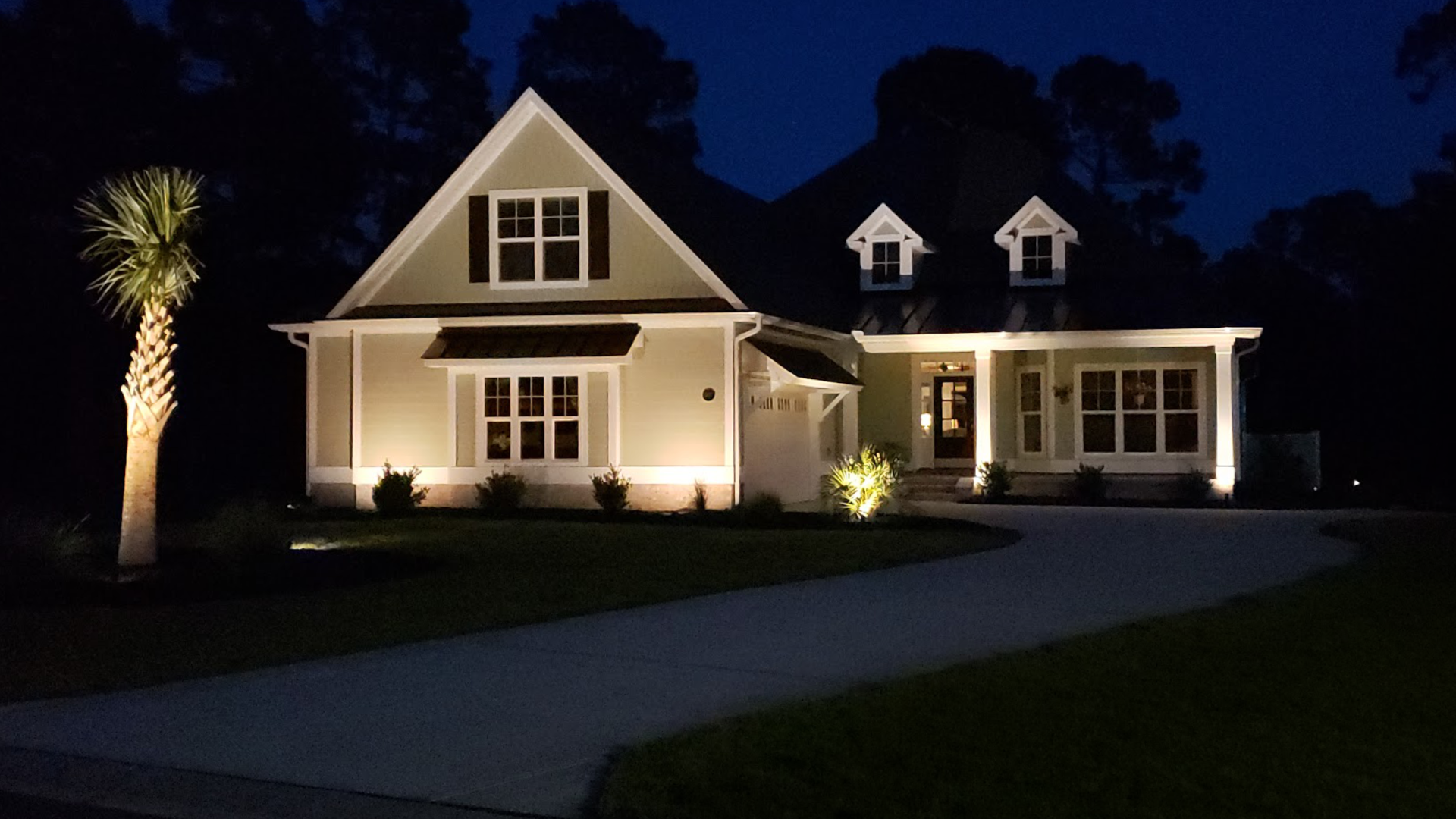 Outdoor landscape lighting done on a house