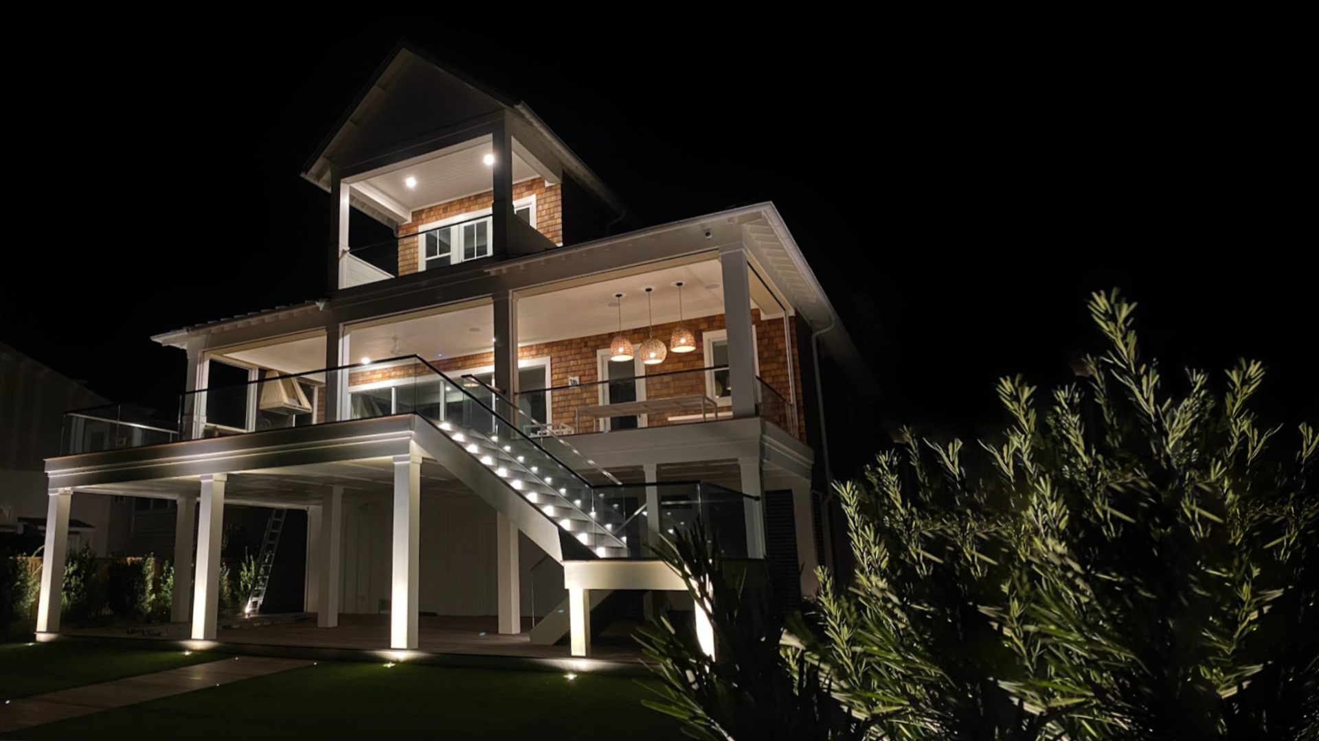 Outdoor landscape lighting on a house