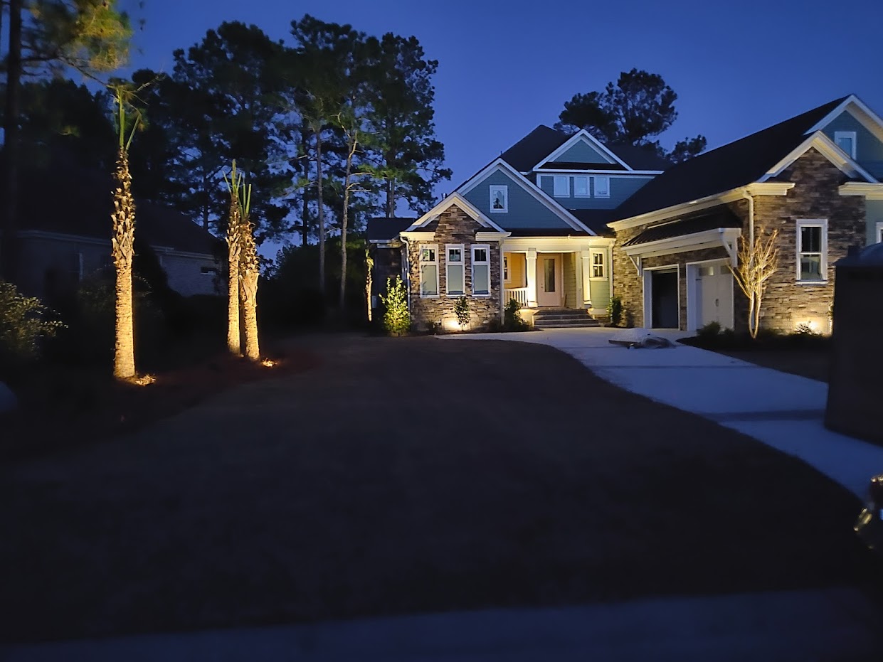 Outdoor landscape lighting done on a house